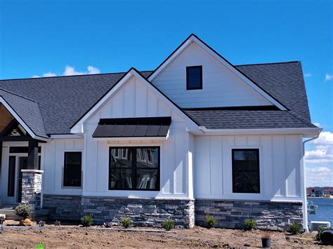 house with metal roof accent|pictures of residential metal roofs.